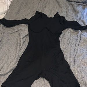 This is a black romper. Size medium.